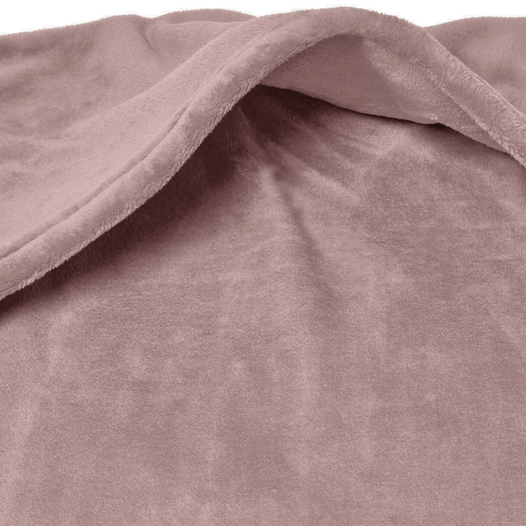 "Soft blush pink fleece fabric of the Snhug Sit® blanket showing its plush texture